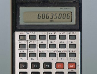 Calculator and financial documents representing fiduciary duty