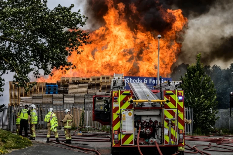 Fire truck and firefighters representing local fire and rescue