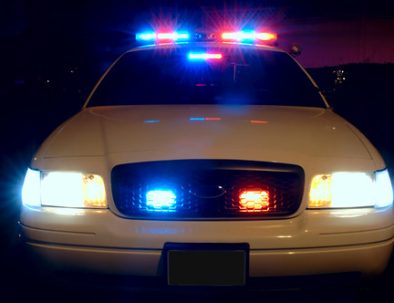 Police vehicle lights representing law enforcement accountability
