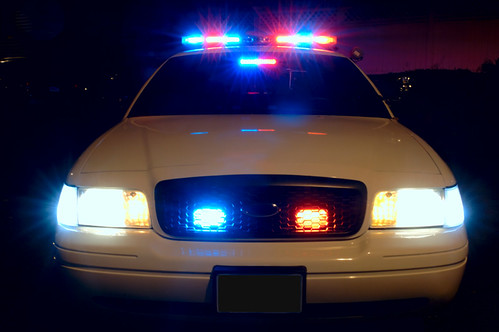 Police vehicle lights representing law enforcement accountability